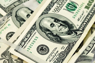 Банк России обновил курсы доллара, евро и юаня